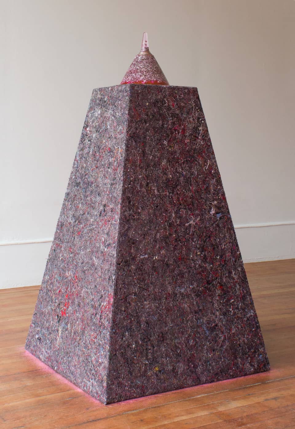 Tinted resin cone on matching plinth
